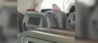 Mid-Air Scare: 22-Year-Old Tried To Open Emergency Exit...